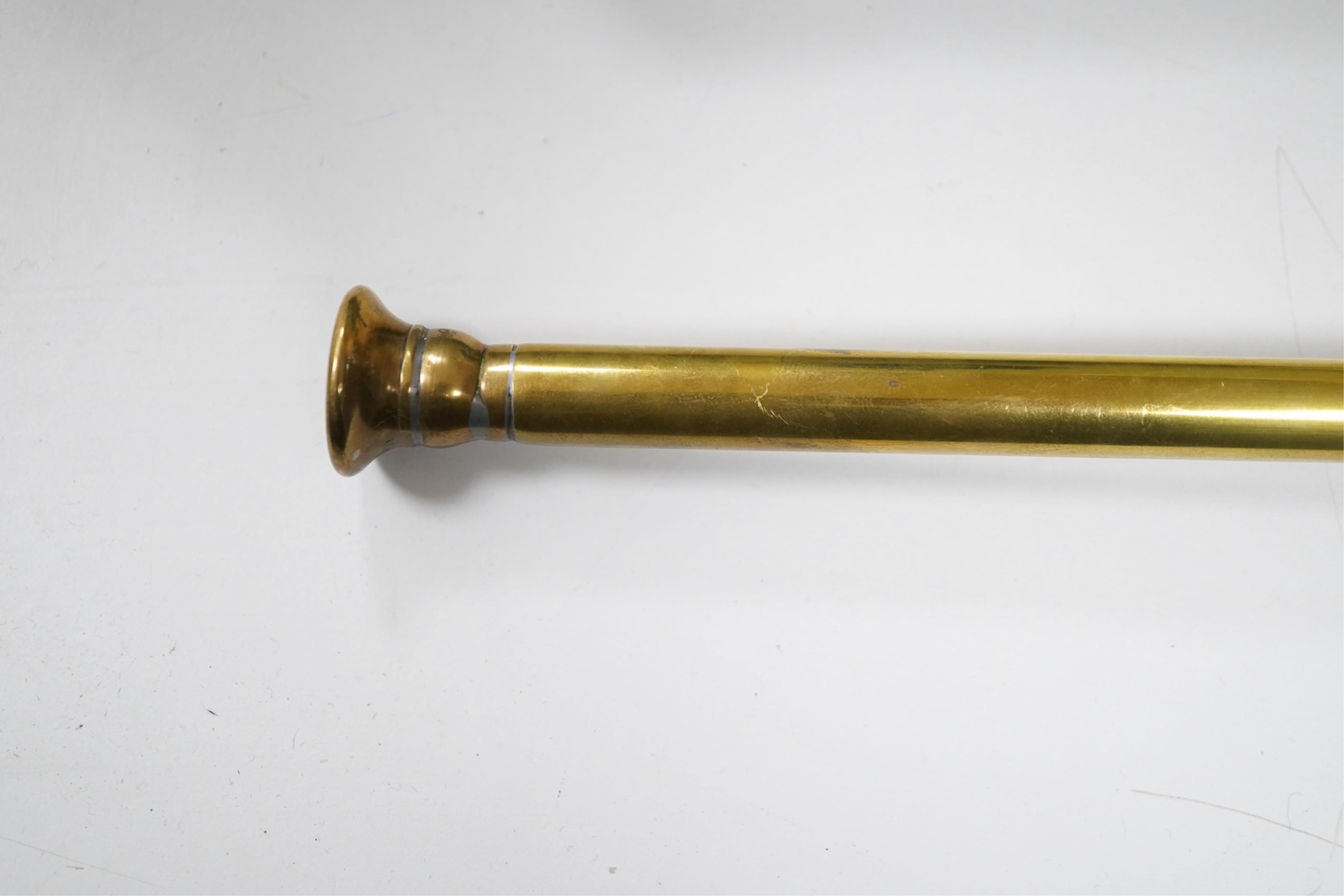 A pair of brass horses hames and a copper hunting horn (3)